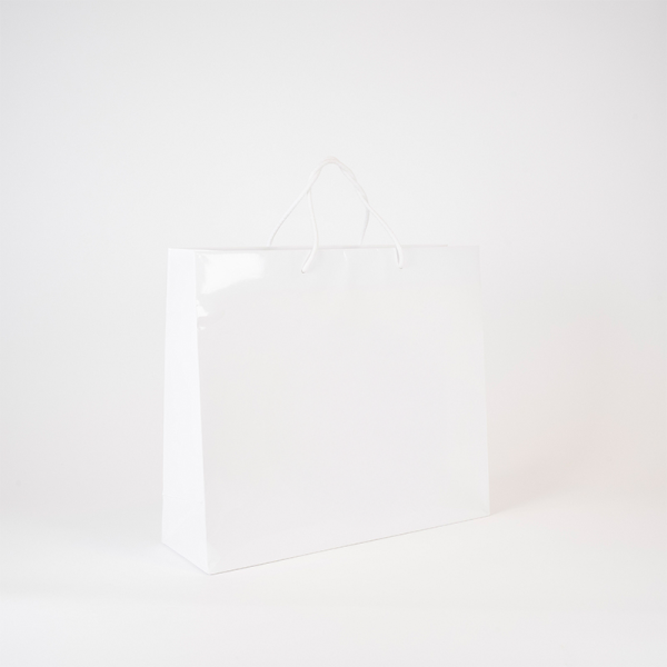 Shopper in carta monopatinata manuale generica 190 gr, manico in cotone